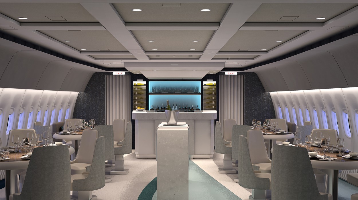 Ferrari Press Agency Ref 7348 Air1 26/09/2016 See Ferrari text. Picture MUST credit : Crystal AirCruises All the luxury of cruise ship is being fitted to a customized passenger jet promising the ultimate holiday for wealthy travellers.And it will included Michelin-star inspired meals.The Boeing 777-200LR aircraft will transport up to 84 people to some of the world’s most exotic and remote locales in a style that makes first class on most airlines look like economy.It will be used by cruise company Crystal for its AirCfruises tours for 14, 21 and 28-day itineraries.Crystal’s privately owned Boeing 777-200LR is currently being transformed to meet Crystal’s exceptional standards of customization, and will boast plush, fully reclining Crystal “exclusive class” seats, airy social spaces, large flat-screen TVs, butler and concierge services and Michelin Star-inspired cuisine.Guests will also enjoy creature comforts and conveniences including Bose noise cancelling headphones, Apple iPads, complimentary global WiFi, 24-inch interactive TVs with on-demand programming and music library.Crystal’s Boeing is larger and newer than any private jet travel option, appointed with features more commonly found in luxury suites. The custom exclusive class seats fully recline to lie-flat beds, measuring 73.5 / 186 cms inches long, for maximum personal space and ergonomic comfort, while the expansive social lounge with stand-up bar, two divans and four dining tables with dedicated seating for six guests.This is said to help foster friendly camaraderie among luxury travellers. Cuisine will be prepared by a dedicated executive chef in two state-of-the-art galleys and paired with a premium wine list.Seats also have individual USB ports and power outlets, and a live cockpit-to-ground listening channel. Custom blankets, lumbar and pillows, plush duvets and mattress toppers – as well as spacious lavatories– offer more than the comforts of home during the global journeys. The aircraft will be ready or its first passengers in 2017.Crystal’s CEO and president, Edie Rodriguez says the aircraft is “a groundbreaking development in the luxury travel industry.” He added:’ “Even the savviest travelers and guests who have sailed on our award-winning ocean cruises many times will relish brand new opportunities to explore places impossible to reach by water, all with Crystal’s signature personalized service and the highest standard of luxury at every point of travel.”Crystal Cruises , which also operates ocean cruises, has earned more “world’s best” accolades than any other cruise line, hotel, or resort in history. OPS: Rendering showing how the interior of the Crystal AirCruises Boeing 777-200LR will look when fitted out.The lounge and bar Picture supplied by Ferrari, Image: 301061361, License: Rights-managed, Restrictions: , Model Release: no, Credit line: Profimedia, Ferrari